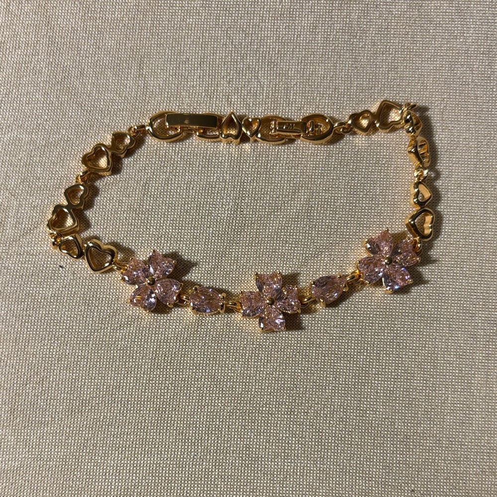 Elegant Gold and Pink Floral Bracelet